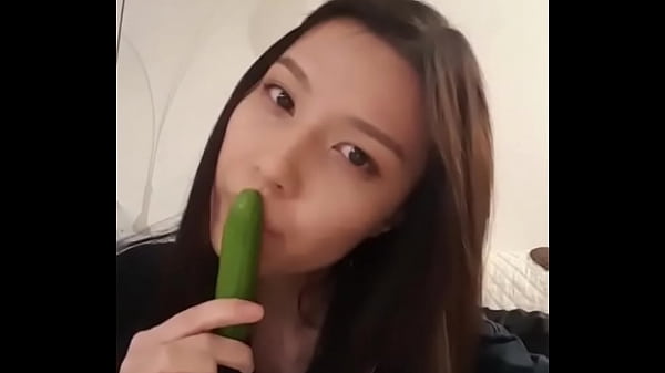 Asian Beauty Passionately Licks Tiny Vegetable in Intimate Sensual Scene
