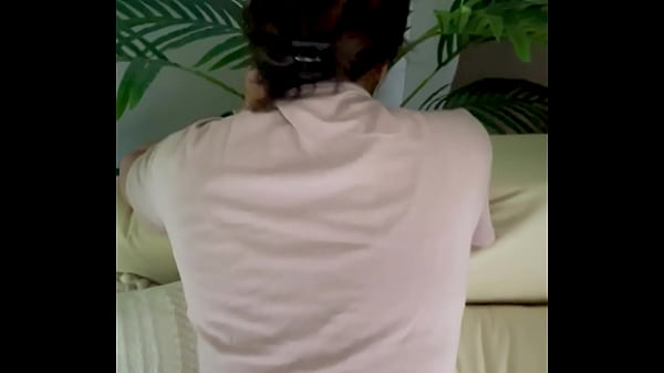Asian Couple Shares Intimate Sofa Moments on Vacation